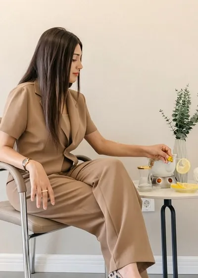 Business woman starting to drink tea